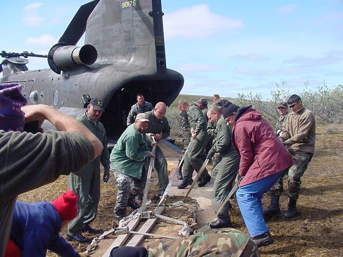 Icky is hauled up the ramp into Chinook 89-00176.