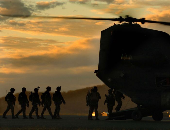 U.S. Army Special Forces Soldiers board an MH-47E Chinook from the 160th Special Operations Aviation Regiment, for infiltration training in Queensland, Australia, during joint/combined Exercise Talisman Sabre 2005.