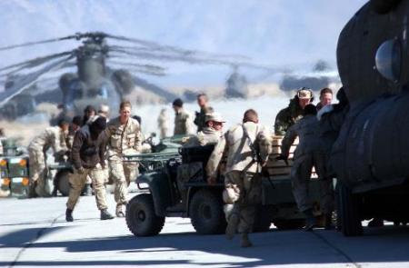 Loading ammunition aboard a CH-47 at Bagram Air Base.